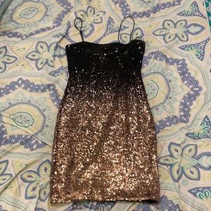 Black and rose gold body con dress